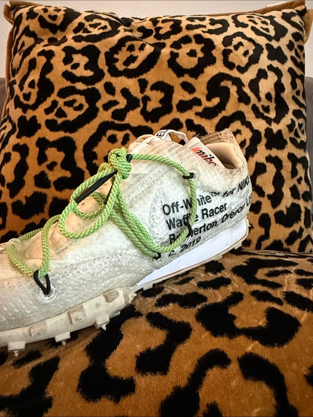 White sneakers with lime green laces